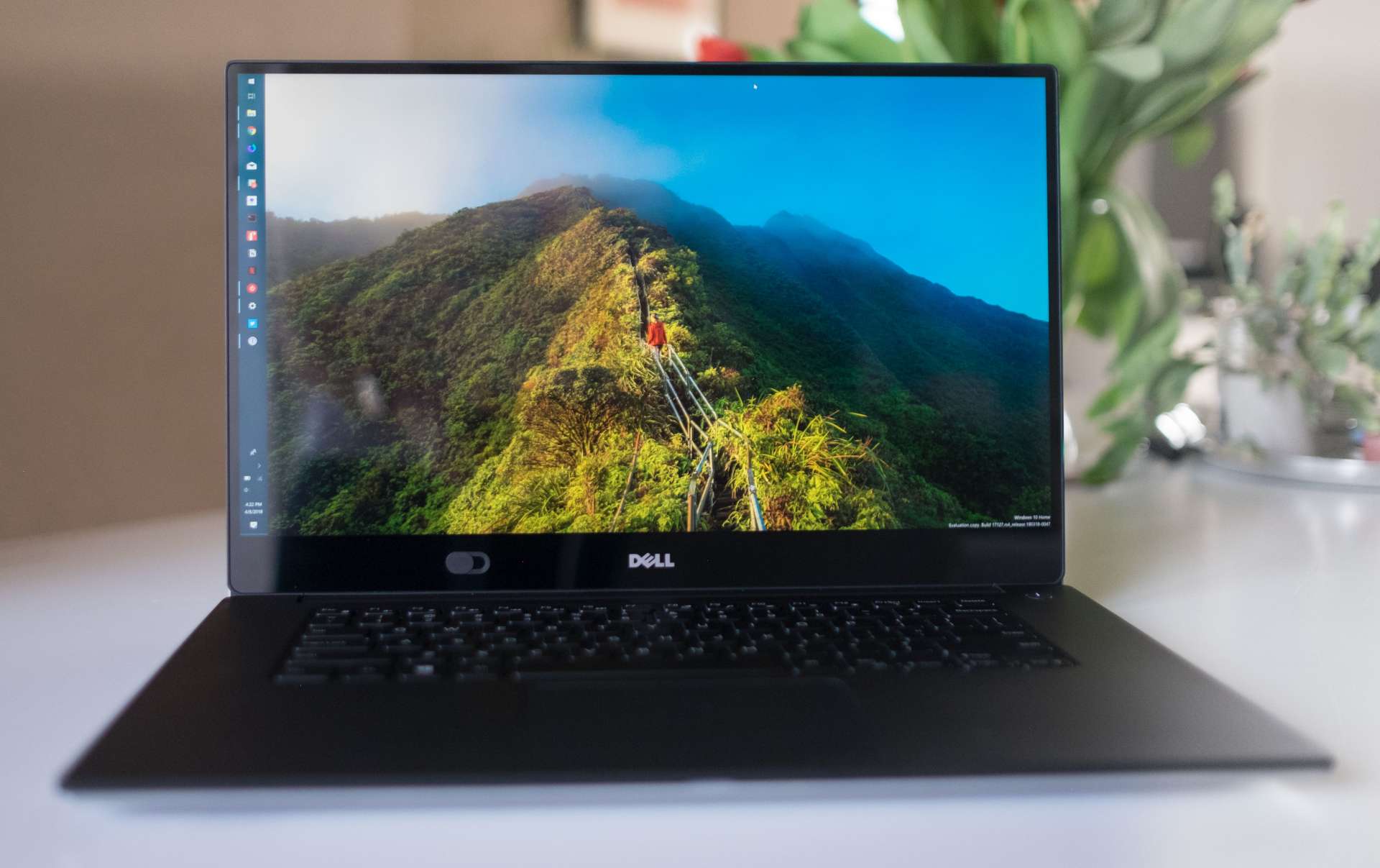 Dell XPS 15-inch laptop open on the table Dell XPS 15-inch laptop open on the table